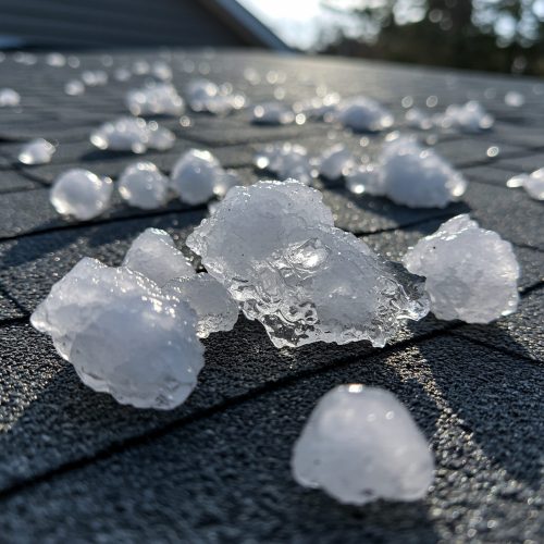 Large Hail on roof in Colorado and Wyoming - Photo taken by Rocky Mountain Adjusters